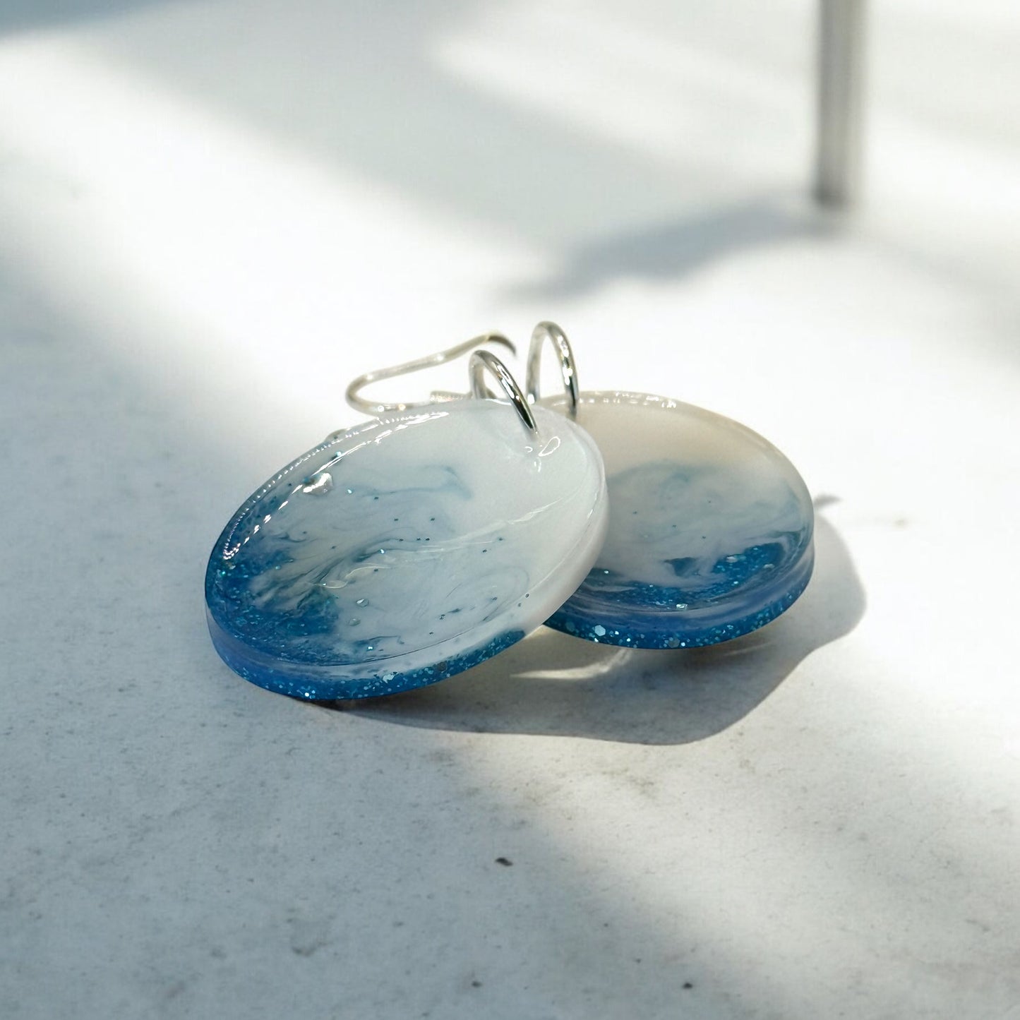 Blue Sparkle White Swirl Oval